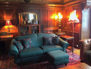 Large living room with wood-burning stove | Dunvarlich House, Aberfeldy