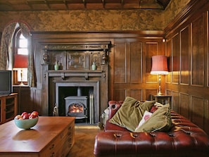 Large living room with wood-burning stove | Dunvarlich House, Aberfeldy