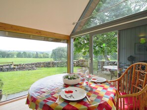 Enjoy an evening meal in the conversatory | Tullibole Castle Longhouse, Crook of Devon