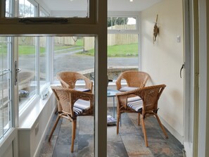 Sun room | Dunstanburgh View - Proctors Stead Cottages, Dunstan, near Craster