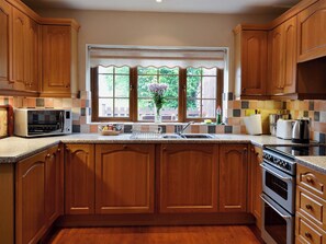 Kitchen area | Swallowtail Cottage - Studley House Farm Cottages, Ebberston, near Scarborough
