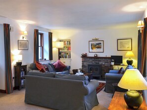 Relaxing living area with gas ‘log-effect’ stove | Coulags Croft, Coulags, Strathcarron