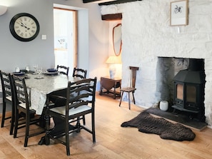 Spacious dining room with wood burner | Annies Cottage, Edinbane, near Portree
