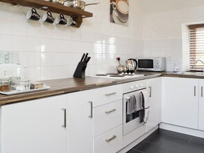 Well-equipped fitted kitchen | Bodlondeb, Plas Gwyn, near Pwllheli