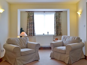 Comfy seating in lounge | Garden Farm Cottage, Ilam, near Ashbourne