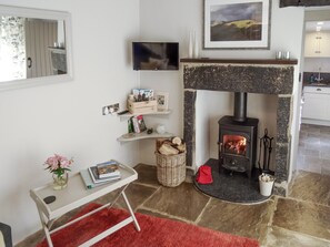 Relax and unwind in this cosy living room with wood burner | Goose Croft, Edale, Hope Valley