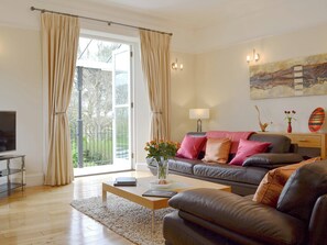 Spacious, light and airy living room with balcony access | Carnethic HouseOne Acre View, Fowey