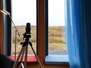 The living room affords spectacular views towards the Hebrides | Fionn Croft Lodge, Melvaig, near Gairloch