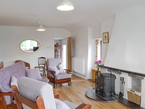 Good-sized living room with wood burner | Preswylfa, Llanddona, near Bangor