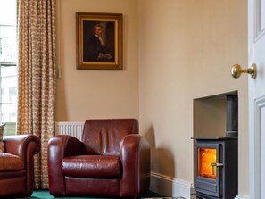 Living room with wood burner | Langford Villa, Filey