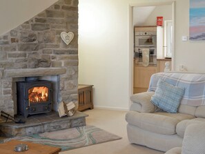Cosy living and dining room adjoins the kitchen | Bay View, Hunmanby Gap, near Filey