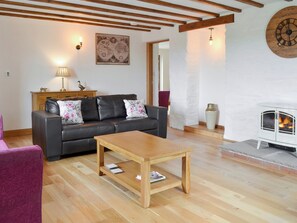 Spacious living room | Llofft Storws - Bronallt Barns, Llanynghenedl, near Holyhead