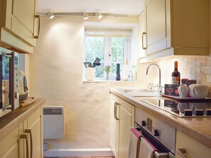 Modest galley-style kitchen | Westover Cottage, Nr. Abingdon