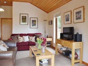 Comfortable leather sofas in the open plan living area | Rowanburn Lodge, Greystoke, near Penrith
