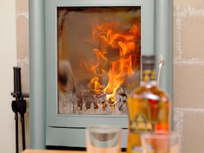 Welcoming wood-burning stove | Carness West, North Ballachulish, Glencoe