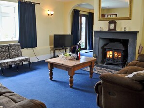 Warm and toasty living room | Granny Bond’s Farmhouse - Craneham Farm, Buckland Brewer