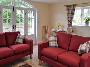 Living room with dining area | Holly Cottage, Longhoughton, near Alnwick