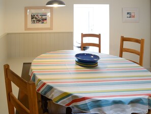 Delightful circular dining table | The Fish House - Rispond Lodge Estate, Rispond, near Durness