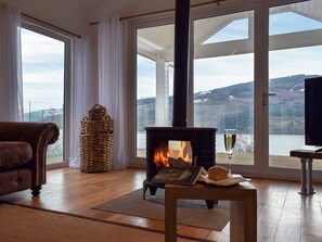 Living area with stunning views over Loch Tay | Chapelburn, Fearnan, near Aberfeldy