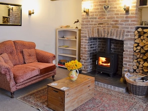 Comfortable living room with wood burner | The Cottage, Broadstairs