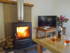 Warm and welcoming living room | Charlie’s Cottage, Muasdale, near Campbeltown