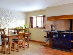 Modern fitted farmhouse-style kitchen area with Rayburn | Grange Farm Cottage, Spaunton, near Lastingham