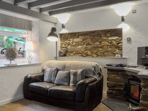 Characterful living area with exposed brickwork | Grange End Stables - Grange End Cottages, Grasmere
