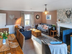 Beautifully presented living area | Garden Cottage, Tain