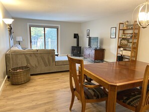 Spacious room with gas wood stove and Roku smart tv 