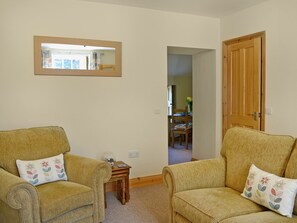 Homely living room | Waulkmill Cottage, Carronbridge near Thornhill