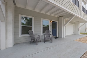 Covered seating on front of home