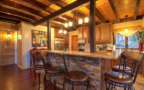 Gather around the kitchen in this open floor plan.