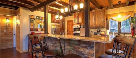 Gather around the kitchen in this open floor plan.