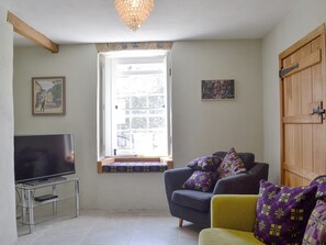 Comfortable sitting room | The Mill Farmhouse (Ty Fferm Y Felin), Llandybie, near Llandeilo