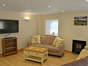 Warm and welcoming living room | Llain Gam, Llaneilian, near Amlwch