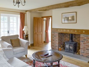 Characterful fireplace with wood burner | Bank Top Cottage, Cropton, near Pickering