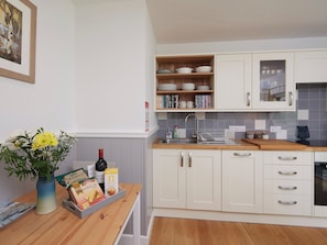 Well-equipped fitted kitchen | Barn Owl Cottage, Newton, near Tain