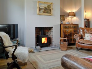 Homely living area with wood burner | Dick ’n’ Liddy’s Cottage, Gargrave, near Skipton