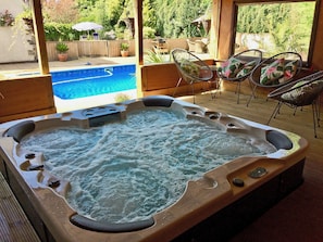 Relaxing hot tub with seating area | Linnets, Fitzhead, near Wivelscombe