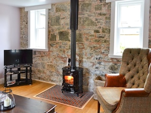 Living room with wood burner | Roseburn Cottage, Moffat