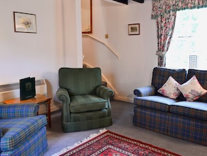 Living room with ornamental period range | Timberwick Green - Akeld Manor, Akeld, Wooler