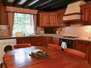 Large, farmhouse-style kitchen/dining room | Timberwick Green - Akeld Manor, Akeld, Wooler