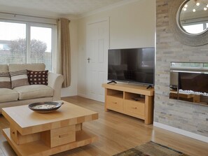 Spacious and comfortable living room | Stepping Stones, Trearddur Bay, near Holyhead