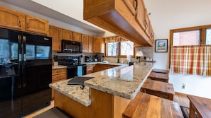 New Kitchen with great appliances, eat-at bar and views of the river