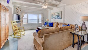 Living Room with ocean views, perfect for rainy day movies & games with family