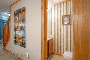 Half bath off the hallway near living room