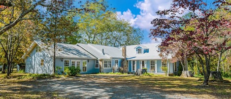 The Farmhouse sleeps up to 21. Seven bedrooms/four baths.  Almost 5,000 sq ft.