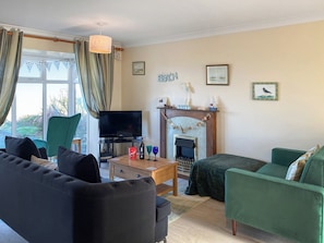 Bright and sunny living area | Tamarisk, Walcott