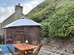 Useful patio area at rear of property | Crovie, Crovie, Gardenstown
