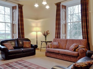 Characterful living room with high ceiling and large windows | The Factor’s House, Kilmartin Glen, near Lochgilphead
